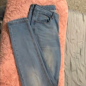 High waisted light blue washed jeans